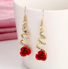 Long 18 Karat Gold Plated earrings with a rose