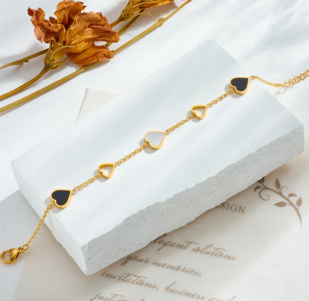 18 Karat Gold Plated bracelet with black and white hearts