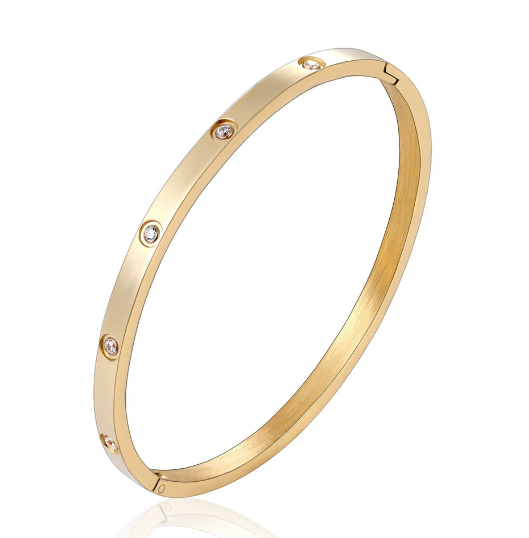 18 Karat Gold Plated solid bracelet with inlaid zirconias