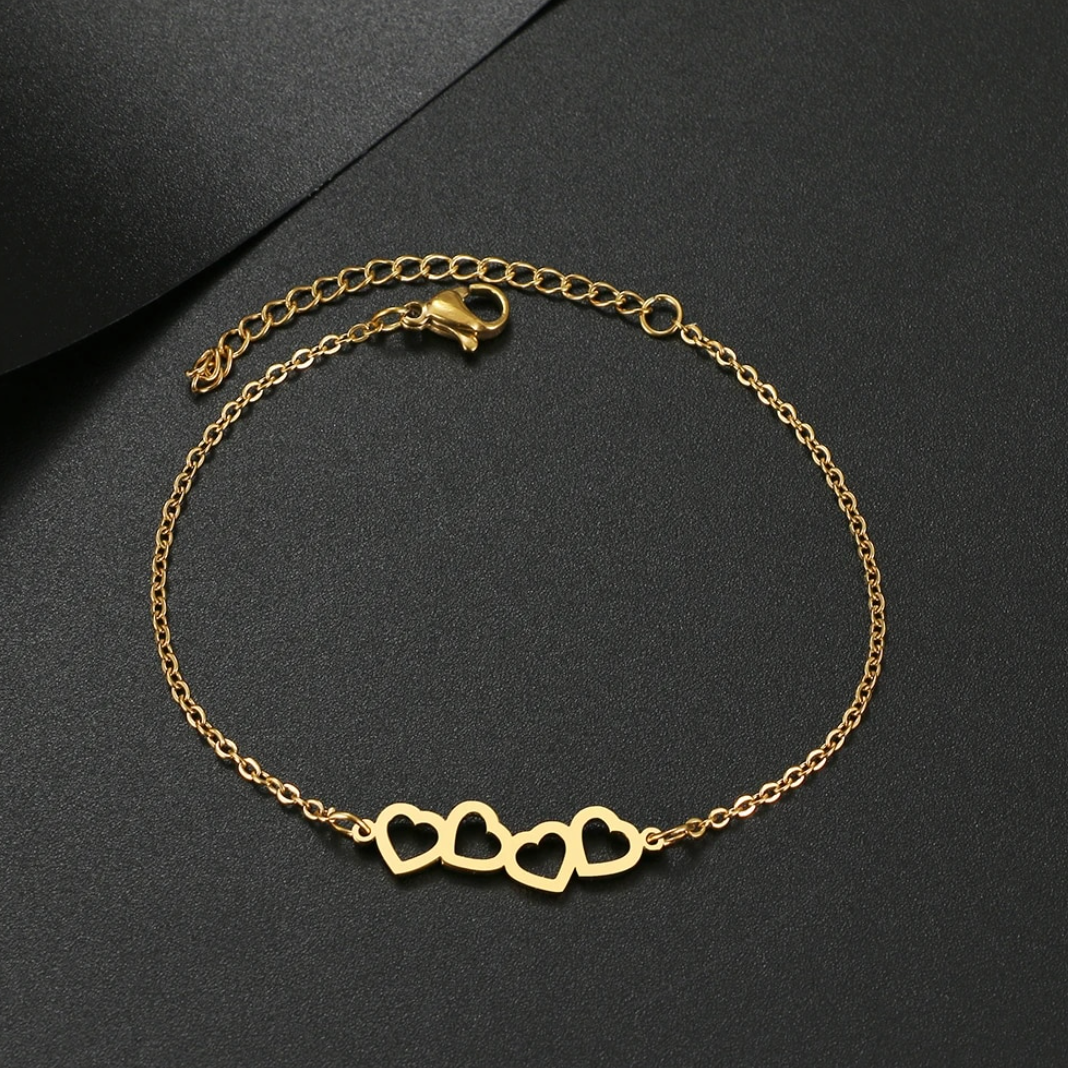 18 Karat Gold Plated bracelet with 4 hearts