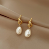 Pearl earrings with knot in 18K Gold plating