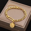 18K gold plated chain style bracelet with antique love coin